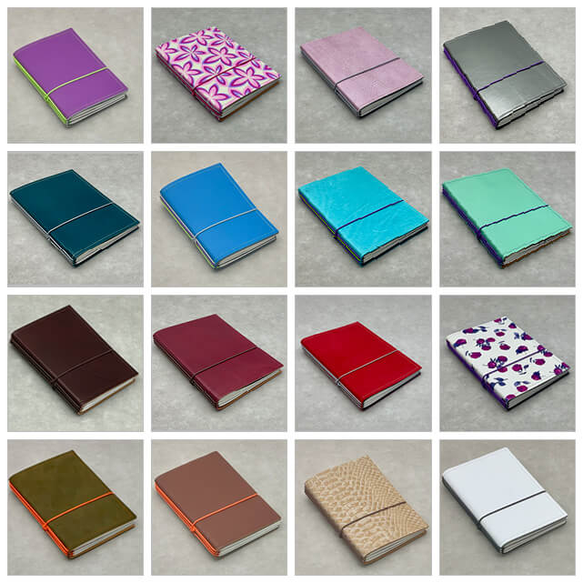 Sonderexemplare handgefertigter Ledernotizbücher in einer bunten Vielfalt aus Farben und Mustern, ordentlich in einem 4x4 Raster angeordnet.